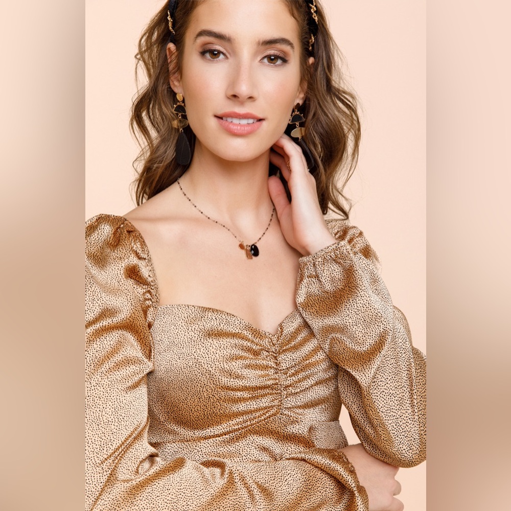 Francesca’s Kelsie Satin Cheetah Peplum Blouse - size S NWT